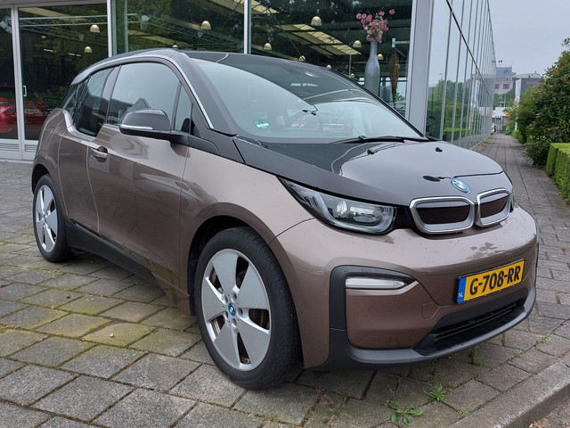 BMW i3 Basis 120Ah 42 kWh | Warmtepomp | Navi + Apple Carplay + Android Auto | Clima | Cruise | Pdc | Led koplampen | Licht+Regensensor