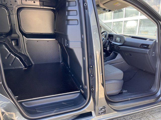 Volkswagen Caddy Cargo 2.0 TDI BPM vrij 4x uit voorraad leverbaar Airco Cruise controle Stuurwielbediening telefoonverbinding Houtenvloer Euro 6