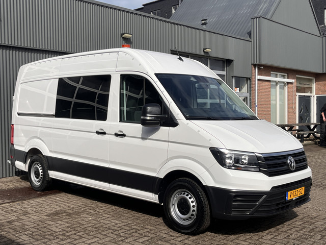 volkswagen-crafter-35-2.0-tdi-l3h3-oud-l2h2-140pk-airco-cruise-control-trekhaak-3000kg-kastinrichting-omvormer-standkachel-werkplaats-navigatiesyst