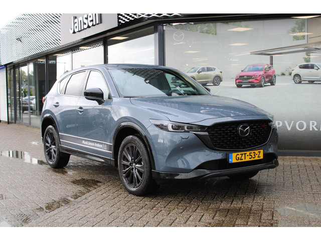 mazda-cx-5-2.0-e-skyactiv-g-m-hybrid-165-homura--comfort-pack--demovoordeel--7.390---navi--adap.cruise--clima--leder--apple-carplay--360-