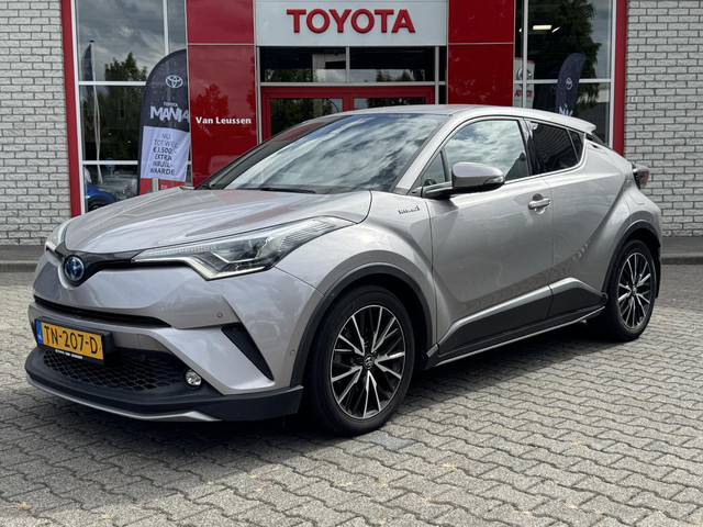 toyota-c-hr-1.8-hybrid-executive-nl-auto-half-leder-tree-planken-jbl-audio-stoel-stuurverw-navi-keyless-park-sensoren-led