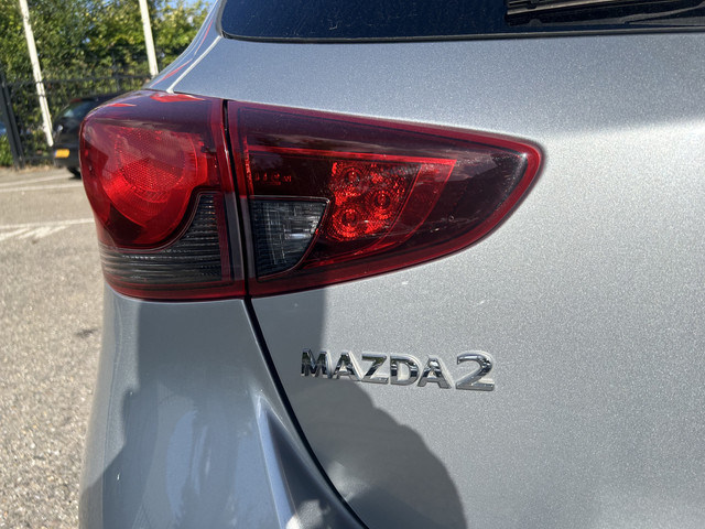 Mazda 2 1.5 Skyactiv-G Comfort    NAVI + CARPLAY    PDC    CRUISE    AIRCO    STOELVERWARMING