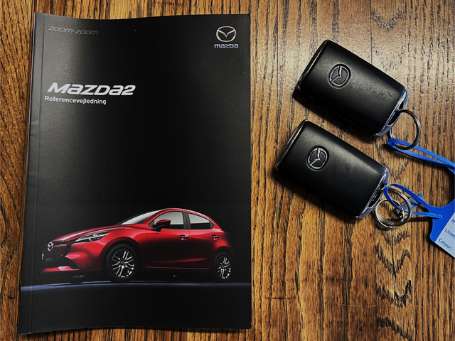 Mazda 2 1.5 SkyActiv-G 90 Homura - Stoel- stuurverwarming, Cruise, Achteruitrijcamera, Airco!