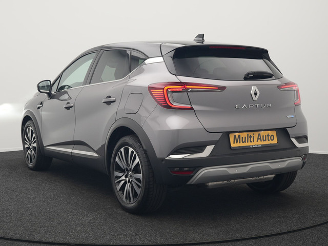 Renault Captur 1.6 E-Tech Initiale Paris Plug In Hybrid 160pk Dealer O.H PHEV | Adaptive Cruise | 360 Camera | Lederen Sportstoelen Verwarmd |