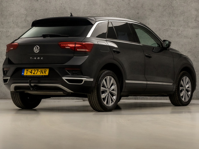 Volkswagen T-Roc 1.0 TSI Sport (STOELVERWARMING, TREKHAAK, GETINT GLAS, SPORTSTOELEN, PARKEERSENSOREN, ARMSTEUN, BLUETOOTH, NIEUWSTAAT)