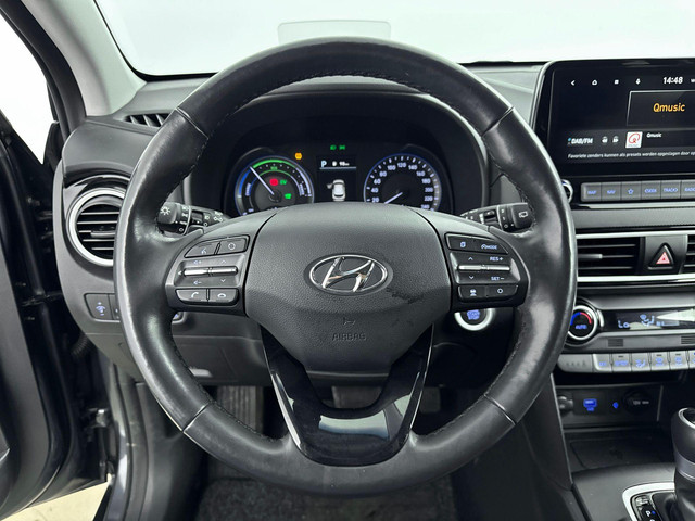 Hyundai Kona 1.6 GDI HEV Premium | Leer | Stoel + stuurverwarming | Trekhaak | Stoelventilatie | 18 Lm-wielen |