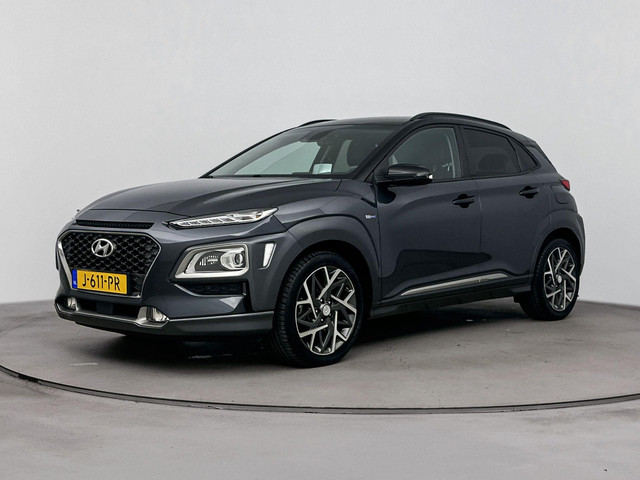 Hyundai Kona 1.6 GDI HEV Premium | Leer | Stoel + stuurverwarming | Trekhaak | Stoelventilatie | 18 Lm-wielen |