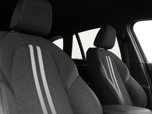 BMW X1 xDrive25e Sportline Plug In Hybrid 221pk Dealer O.H. PHEV | Trekhaak | Camera | Sfeerverlichting | Keyless | Sportstoelen Verwar
