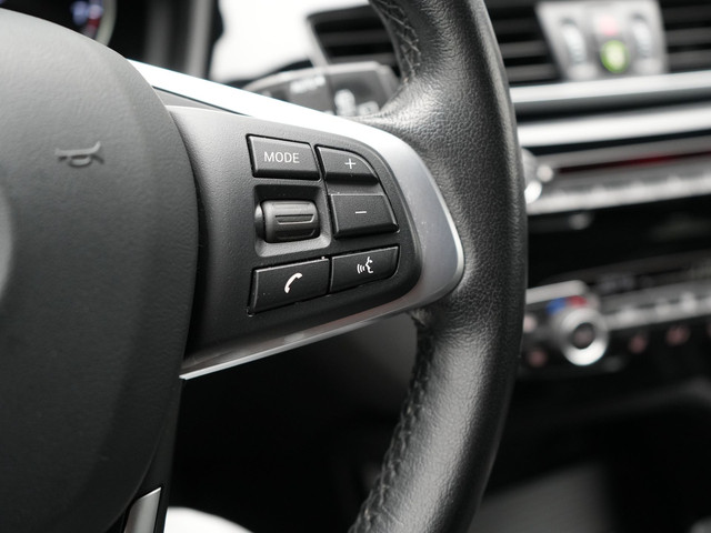 BMW X1 xDrive25e Sportline Plug In Hybrid 221pk Dealer O.H. PHEV | Trekhaak | Camera | Sfeerverlichting | Keyless | Sportstoelen Verwar