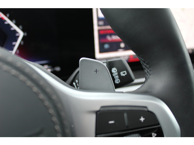 BMW X5 xDrive50e M-Sport | Panoramadak | Luchtvering | Harman Kardon | Iconic Glow | Trekhaak