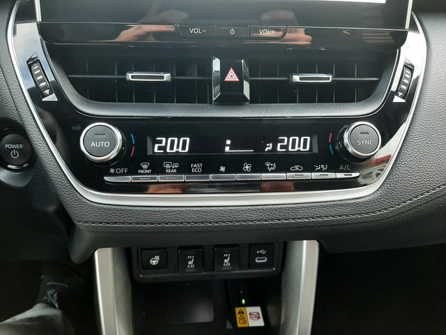 Toyota Corolla Cross Hybrid 140 Style ALL-SEASON PARK-SENSOREN KEYLESS BLIND-SPOT STOEL STUURVERW AD-CRUISE ELEK-ACHTERKLEP CAMERA DRAADLOOS-LADEN